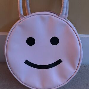 pink smiley face handbag